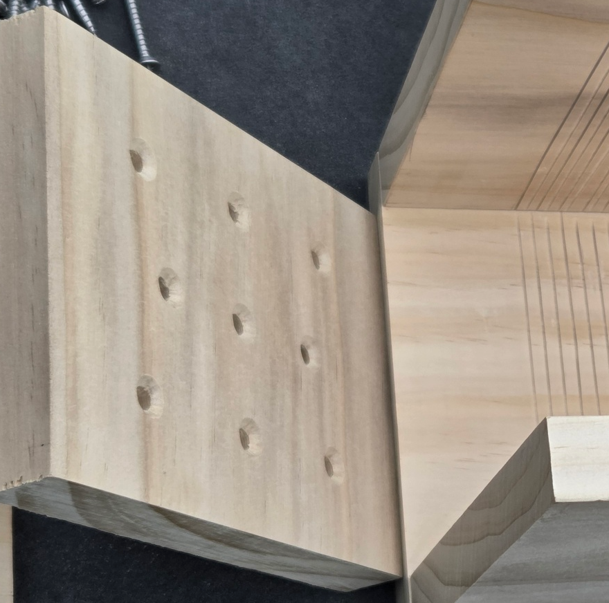 Nest box floor piece with eight 8mm drainage holes drilled through it